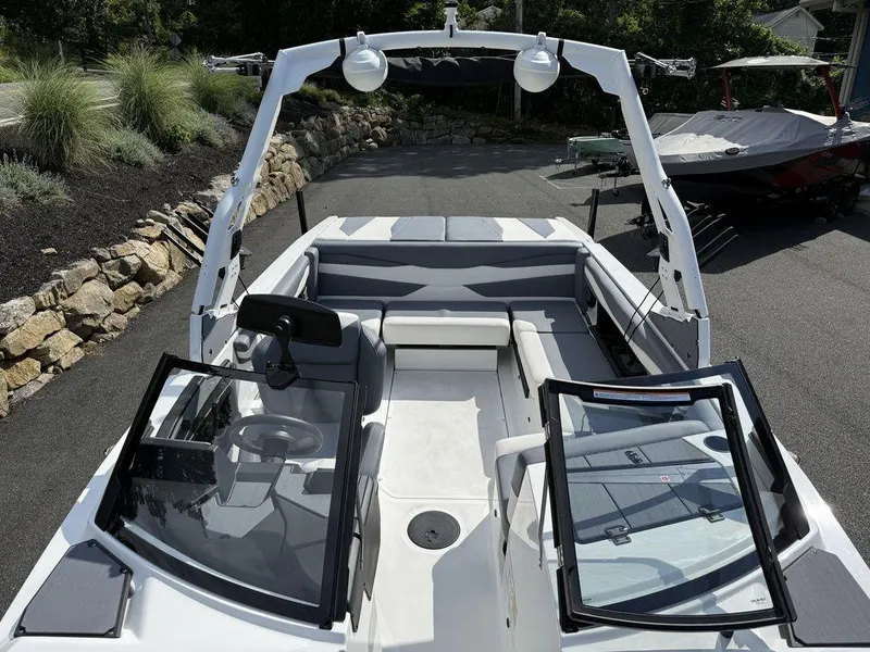 Slide: The Image of 2026 Axis A225 boat interior with open seating and modern design. - 6