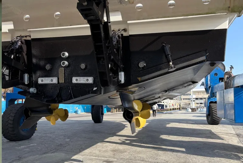 Slide: The Image of Underneath view of a 2020 Prestige 460 boat, showcasing propellers and hull details. - 41