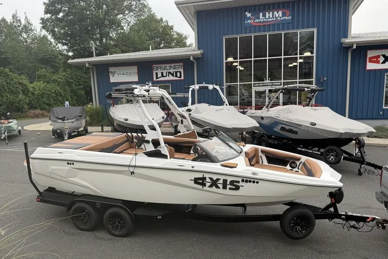 The Image of 2026 Axis A225 boat on trailer at Lake Hopatcong Marine dealership. - 0