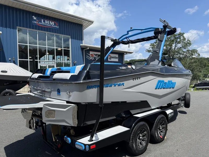 Slide: The Image of 2026 Malibu 22 LSV boat on trailer at Lake Hopatcong Marine dealership. - 10