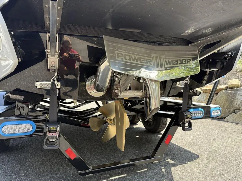 Slide: The Image of 2026 Malibu 22 LSV boat with Power Wedge III and propeller detail. - 16
