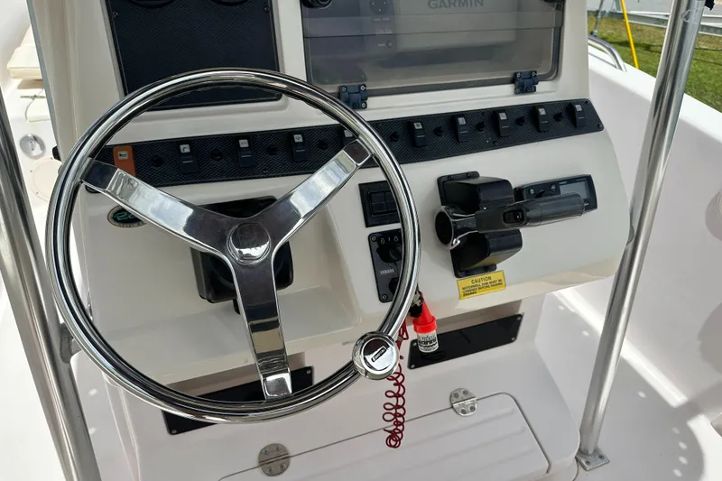 Slide: The Image of Steering console of 2004 Grady-White Fisherman 222 boat with Garmin navigation system. - 32