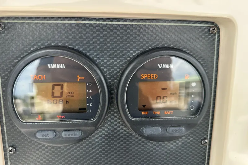 Slide: The Image of Yamaha tachometer and speedometer on 2004 Grady-White Fisherman 222 boat dashboard. - 41