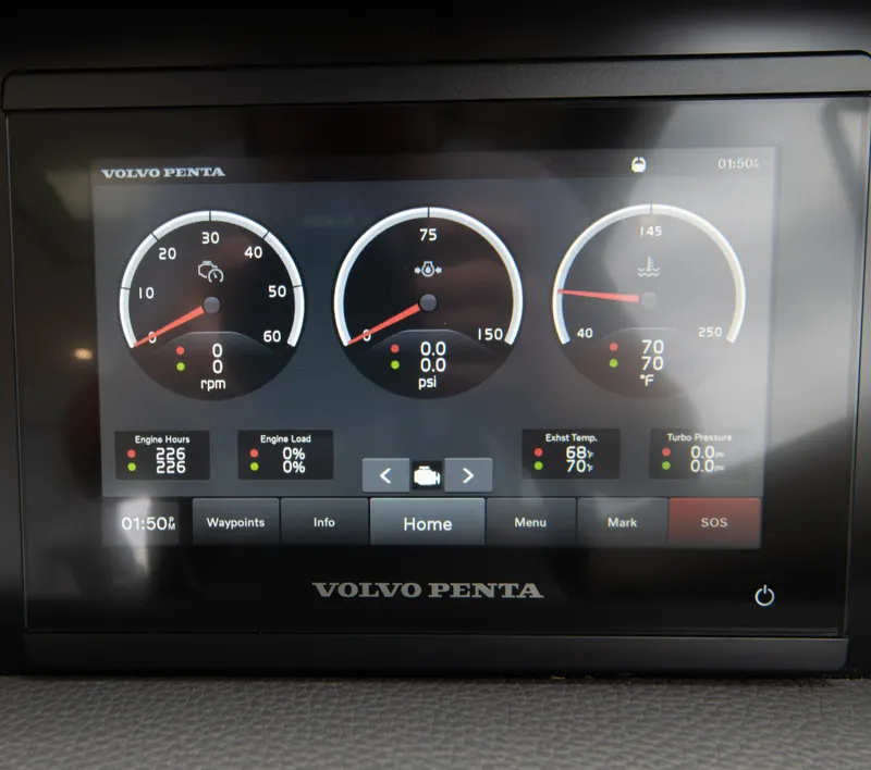 Slide: The Image of Volvo Penta engine display on 2024 Maritimo M55 yacht dashboard, showing gauges and controls. - 37