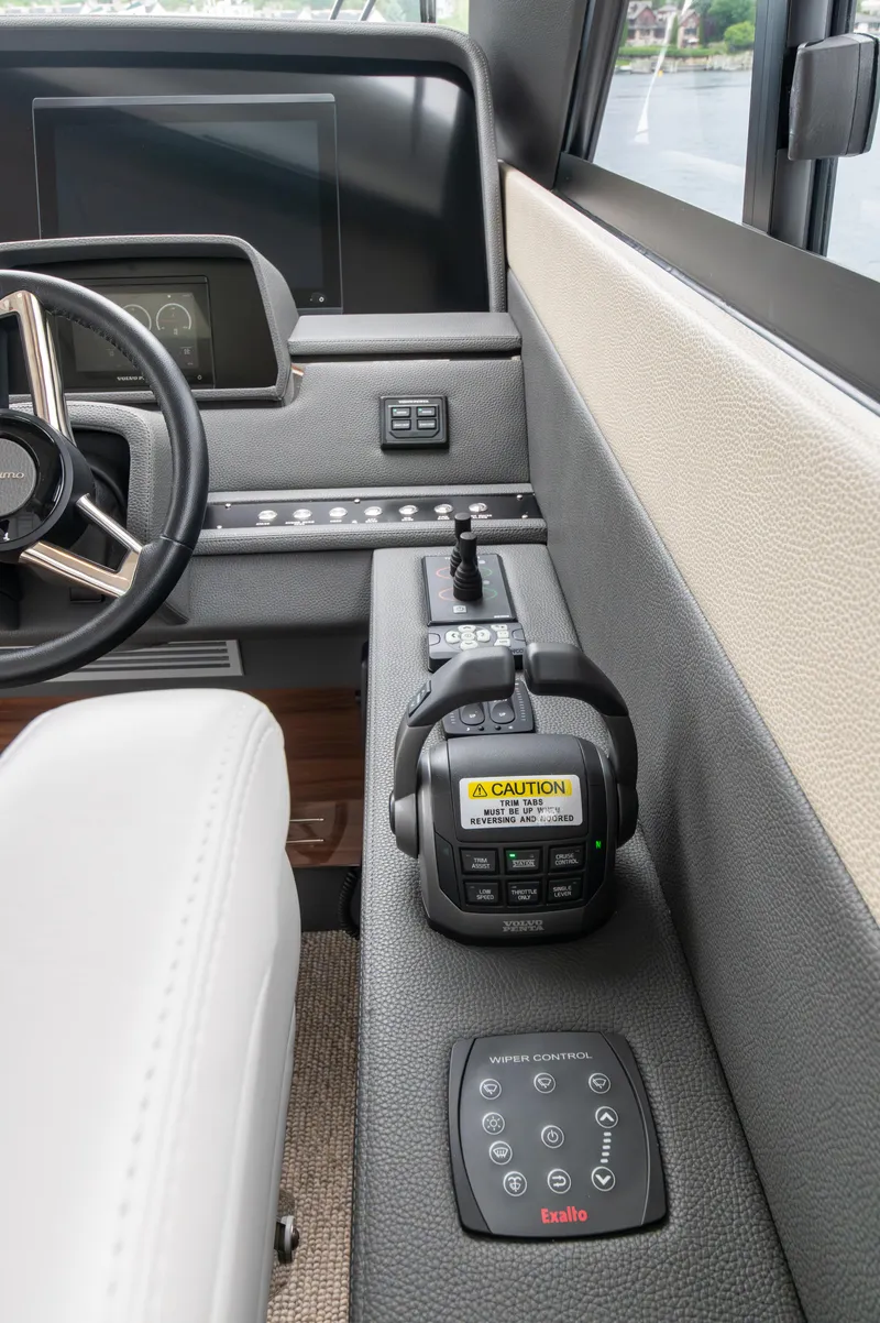 Slide: The Image of 2024 Maritimo M55 helm with advanced controls and navigation systems. - 38