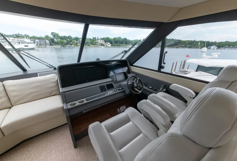Slide: The Image of Luxurious interior of 2024 Maritimo M55 yacht with modern helm and panoramic windows. - 39