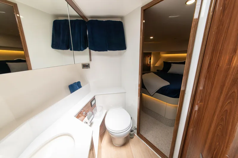 Slide: The Image of Luxurious bathroom and bedroom interior of 2024 Maritimo M55 yacht. - 60