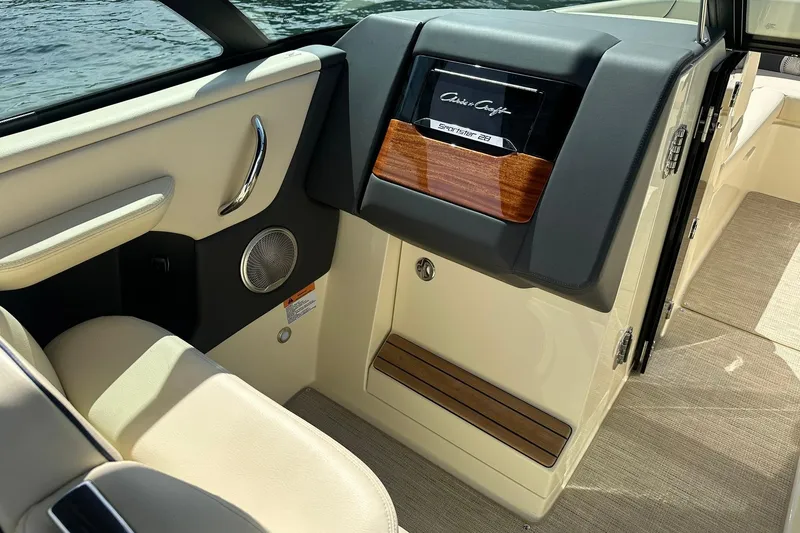 Slide: The Image of 2026 Chris-Craft Sportster 28 interior with elegant design and wood accents. - 18