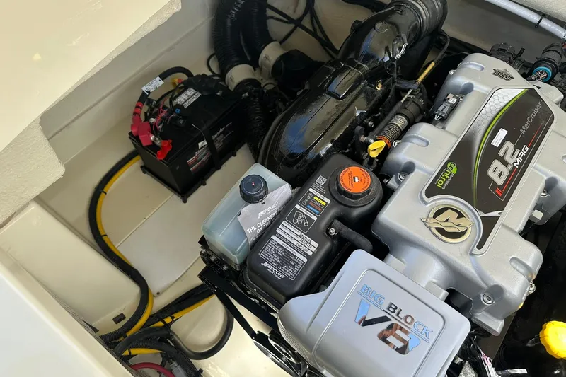 Slide: The Image of Engine compartment of 2026 Chris-Craft Sportster 28 with 8.2L MerCruiser engine. - 34