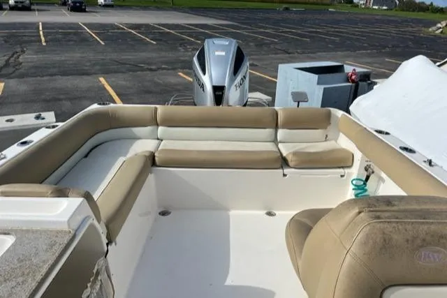 Slide: The Image of 2017 Key West 239 DFS boat with seating and Honda outboard motor. - 4