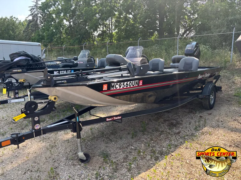 Slide: The Image of 2021 Tracker Bass Tracker Classic XL boat on trailer, parked outdoors. - 3