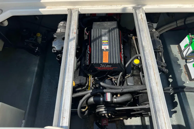 Slide: The Image of Engine compartment of a 1997 Sea Ray 270 Sundancer with Interstate marine batteries. - 21
