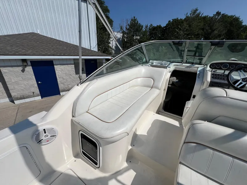 Slide: The Image of Close-up of a 1997 Sea Ray 270 Sundancer boat propeller on a concrete surface. - 7