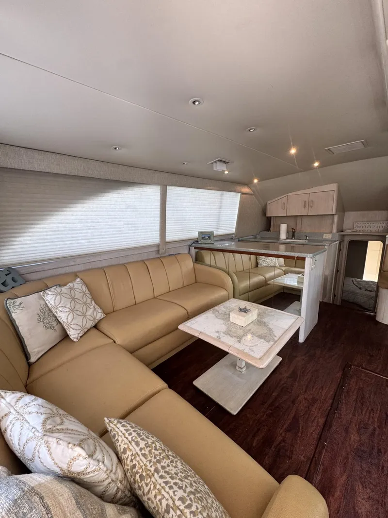 Slide: The Image of Luxurious interior of 1997 Ocean Yachts 45 Super Sport with beige seating and elegant decor. - 10