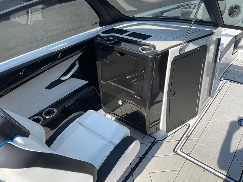 Slide: The Image of 2023 Yamaha Boats 222XD interior with sleek seating and modern console design. - 10