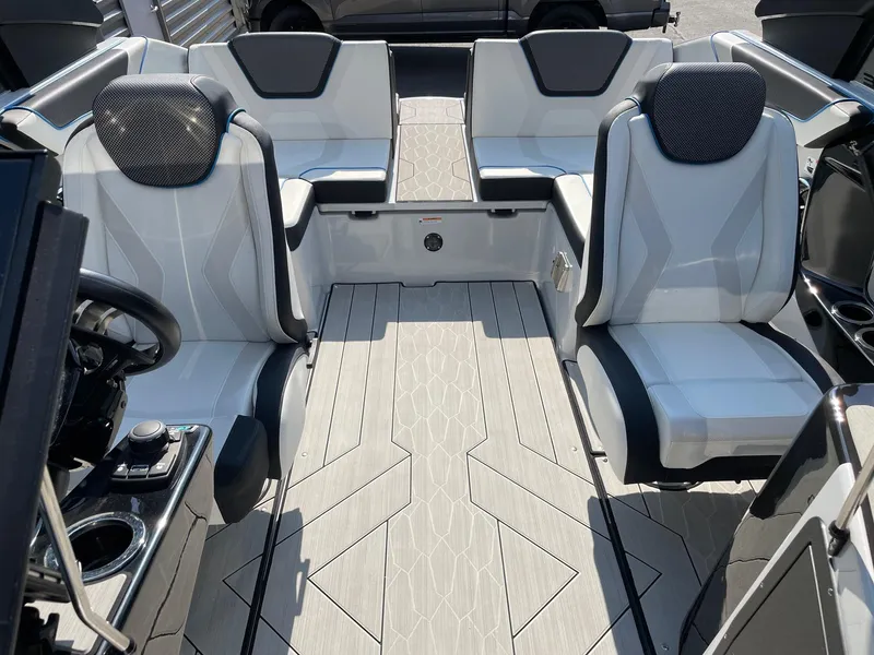 Slide: The Image of 2023 Yamaha Boats 222XD interior with modern seating and sleek design. - 12