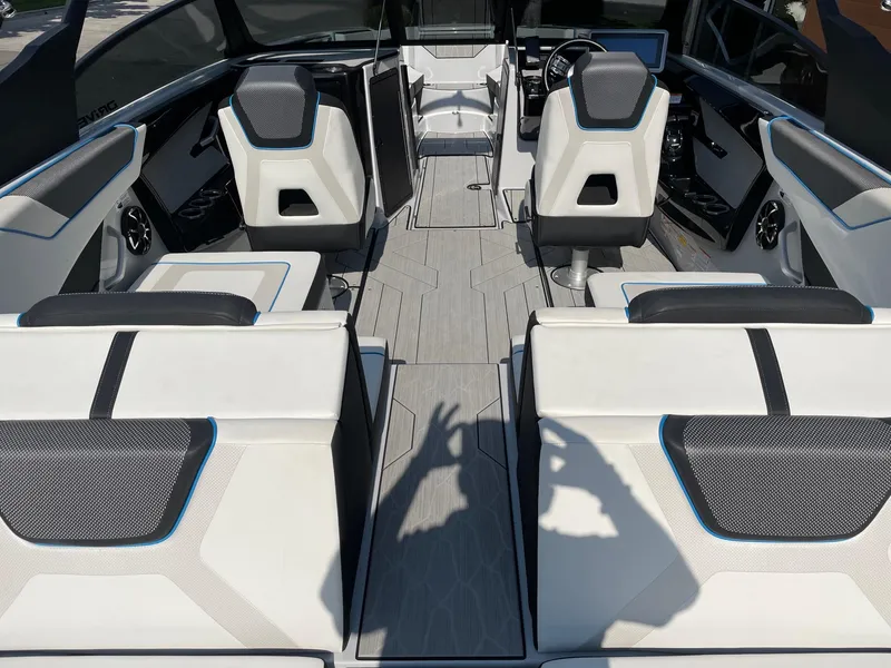 Slide: The Image of 2023 Yamaha Boats 222XD interior with modern seating and sleek design. - 4