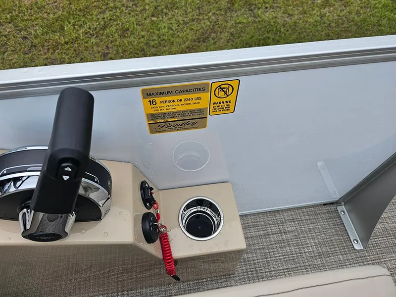 Slide: The Image of Control panel of 2026 Bentley Pontoons Legacy 243 Cruise with capacity warning label. - 15