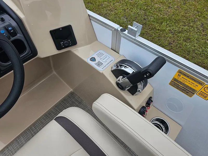 Slide: The Image of 2026 Bentley Pontoons Legacy 243 Cruise helm with controls and seating, showcasing modern design. - 16