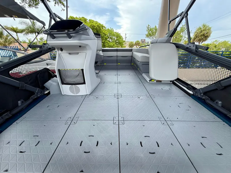 Slide: The Image of 2025 Sea-Doo Switch Sport Compact interior with spacious deck and modern design. - 6