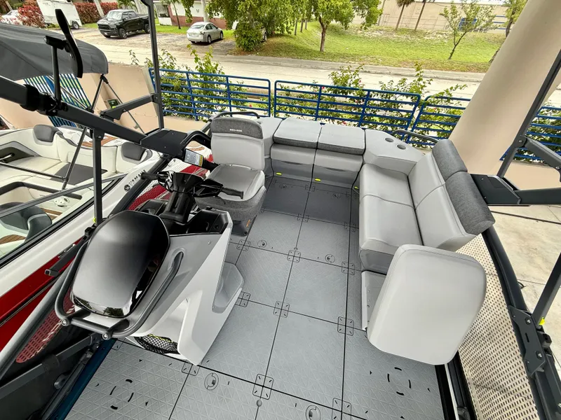 Slide: The Image of 2025 Sea-Doo Switch Sport Compact interior with gray seating and modern design. - 7