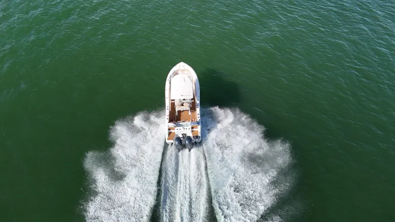 Slide: The Image of Aerial view of 2017 Sea Fox 266 Commander boat cruising on open water. - 10