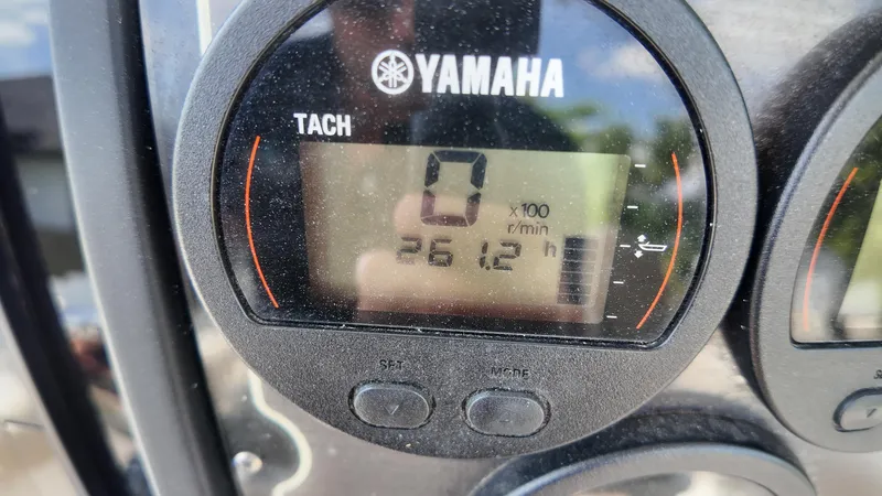 Slide: The Image of Yamaha tachometer display on 2017 Sea Fox 266 Commander boat, showing 261.2 hours. - 19