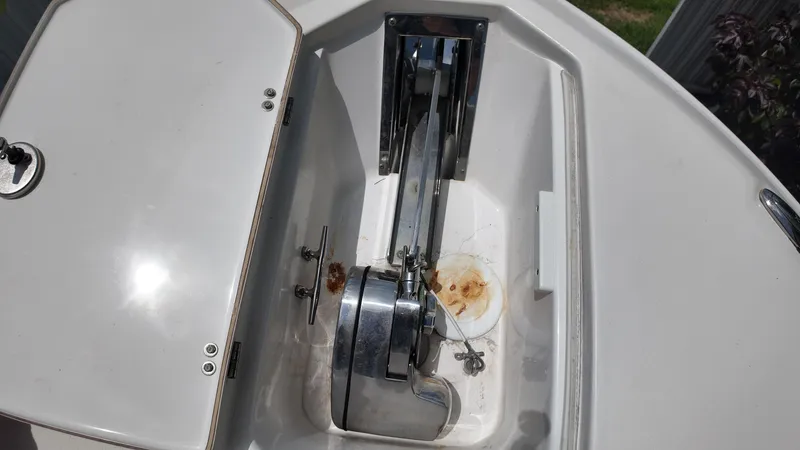 Slide: The Image of Anchor compartment of a 2017 Sea Fox 266 Commander boat, showing anchor and chain. - 24