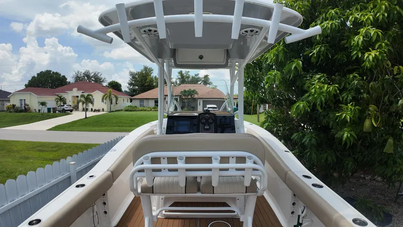Slide: The Image of 2017 Sea Fox 266 Commander boat docked in a suburban neighborhood. - 27