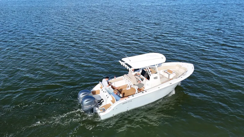 Slide: The Image of 2017 Sea Fox 266 Commander boat cruising on open water. - 4