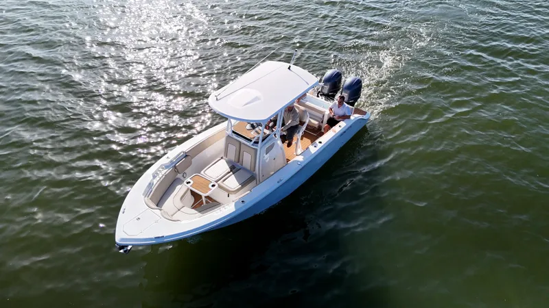 Slide: The Image of 2017 Sea Fox 266 Commander boat cruising on open water, aerial view. - 5