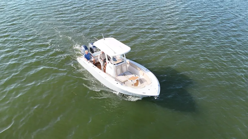 Slide: The Image of 2017 Sea Fox 266 Commander boat cruising on open water. - 7