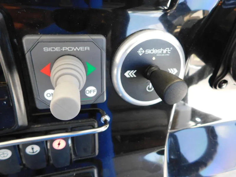 Slide: The Image of Control panel of a 2021 Jeanneau NC 1095 boat with Side-Power and Sideshift controls. - 19