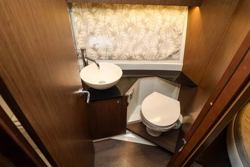Slide: The Image of Bathroom interior of 2021 Jeanneau NC 1095 yacht with modern sink and toilet. - 32