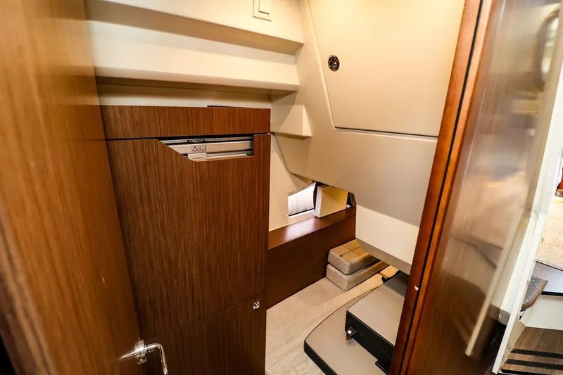 Slide: The Image of 2021 Jeanneau NC 1095 interior cabin with wooden cabinetry and modern design. - 33