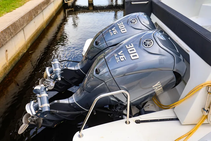 Slide: The Image of Twin Yamaha 300 V6 outboard engines on a 2021 Jeanneau NC 1095 boat. - 10