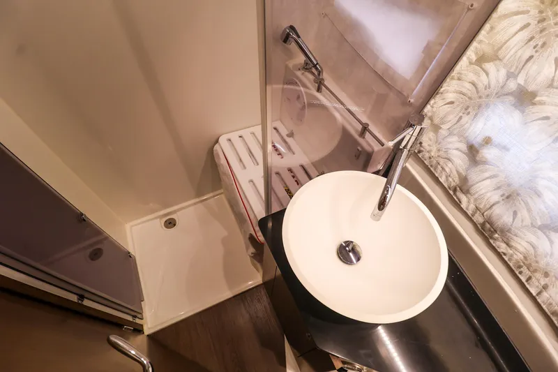 Slide: The Image of Bathroom interior of 2021 Jeanneau NC 1095 boat with modern sink and shower. - 37
