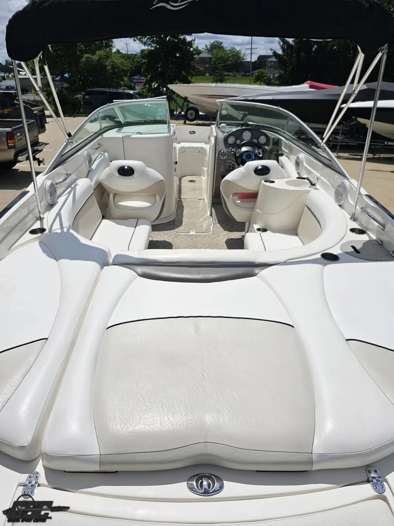 Slide: The Image of 2007 Rinker 246 Captiva Bowrider with spacious seating and sleek design. - 36