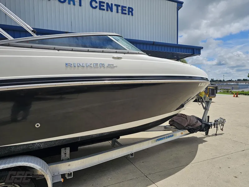 Slide: The Image of 2007 Rinker 246 Captiva Bowrider on trailer at a transport center. - 4