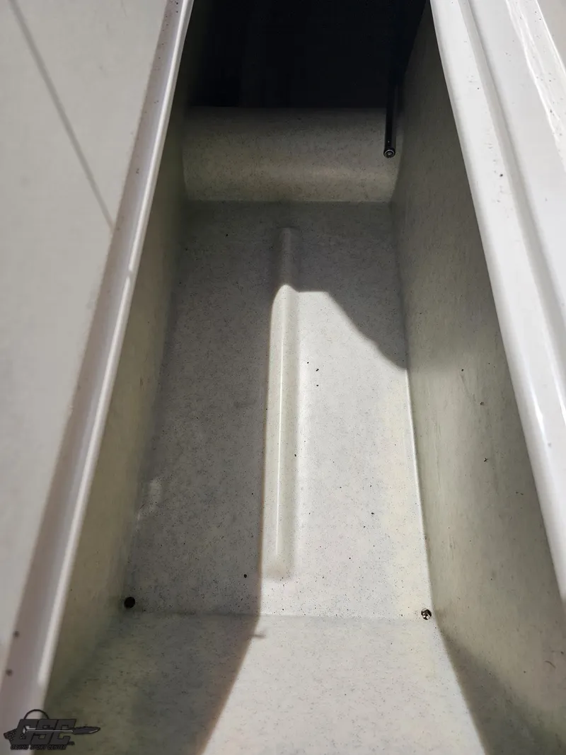 Slide: The Image of Storage compartment of a 2007 Rinker 246 Captiva Bowrider boat. - 40