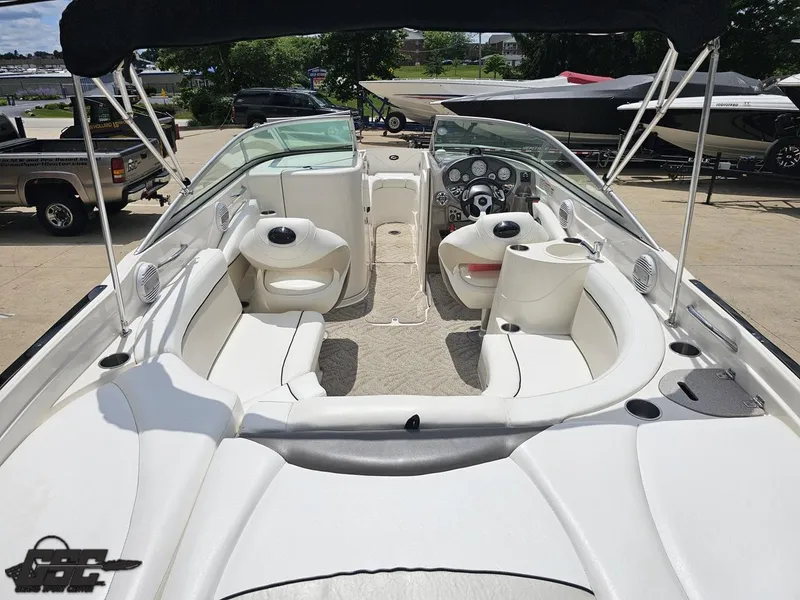 Slide: The Image of 2007 Rinker 246 Captiva Bowrider with spacious seating and modern dashboard. - 43