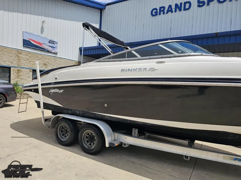 Slide: The Image of 2007 Rinker 246 Captiva Bowrider on trailer at Grand Sport Center. - 6
