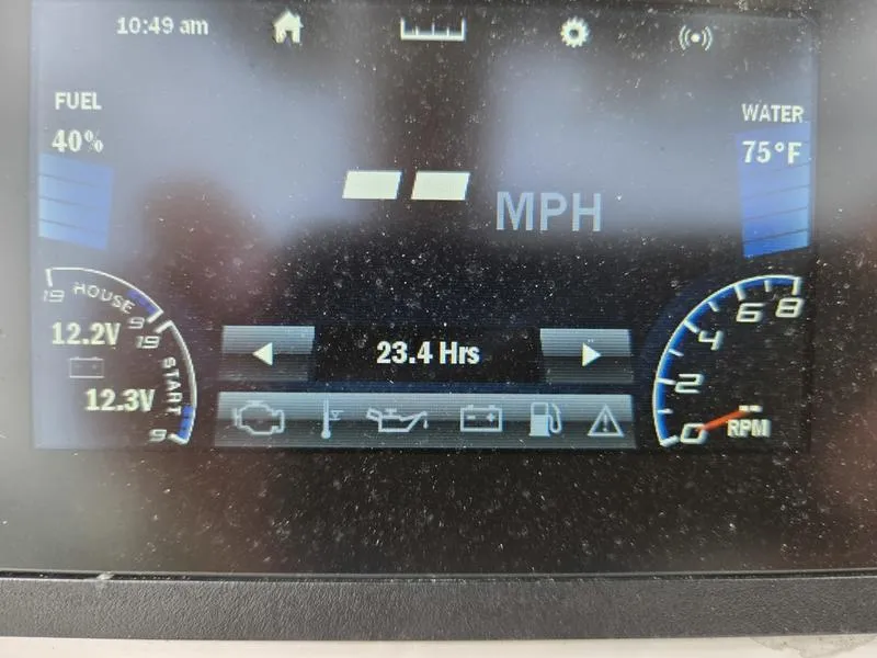 Slide: The Image of Dashboard display of 2022 Yamaha Boats 195 FSH® SPORT showing fuel, water temperature, and engine hours. - 8