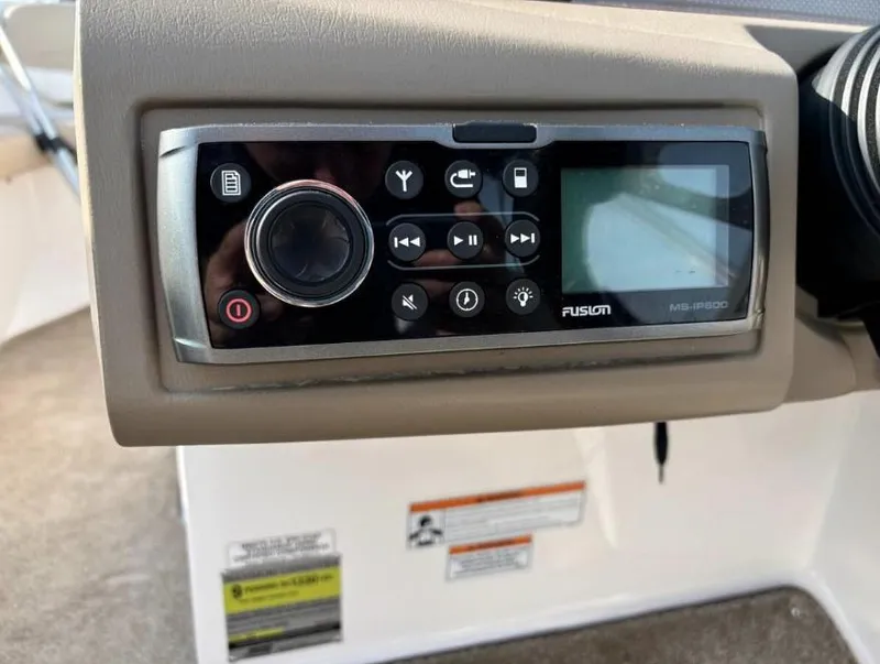 Slide: The Image of Fusion MS-IP500 stereo system on a 2013 Regal 2000 ES boat dashboard. - 6