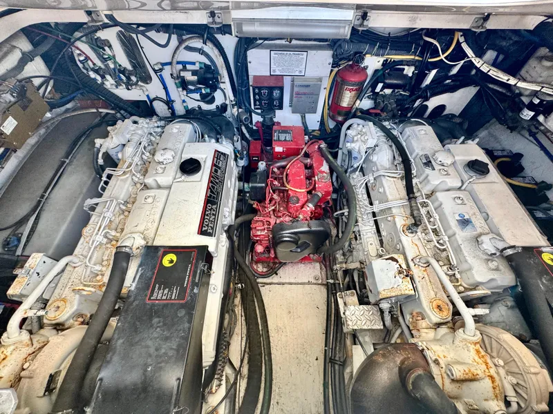 Slide: The Image of Engine room of a 2003 Pursuit 3400 Express boat with Volvo Penta engines. - 25