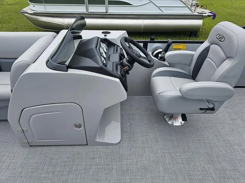 Slide: The Image of 2026 Bentley Pontoons Legacy 243 Cruise with luxurious gray seating and spacious layout. - 14