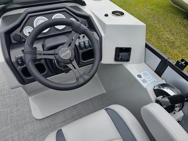 Slide: The Image of 2026 Bentley Pontoons Legacy 243 Cruise interior with gray seating and storage compartments. - 16