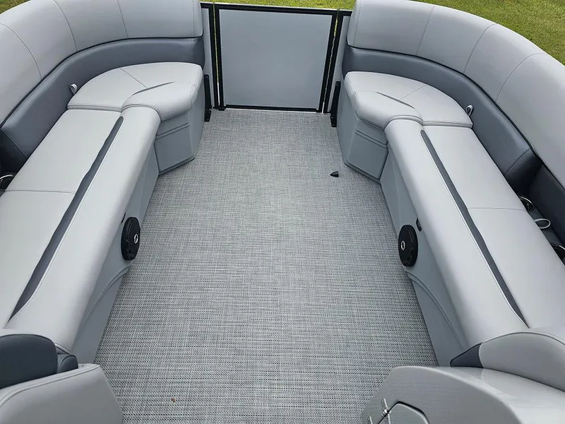 Slide: The Image of 2026 Bentley Pontoons Legacy 243 Cruise capacity label, steering wheel, and cup holder. - 18