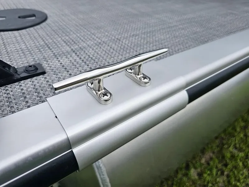 Slide: The Image of 2026 Bentley Pontoons Legacy 243 Cruise interior with gray seating and storage compartments. - 22