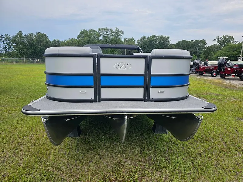 Slide: The Image of 2026 Bentley Pontoons Legacy 243 Cruise on grass, showcasing sleek design and modern features. - 4